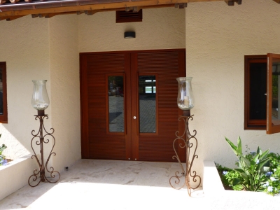 Glass entrance door with carved profile