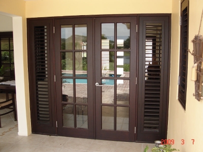 Swing door with operable louvers